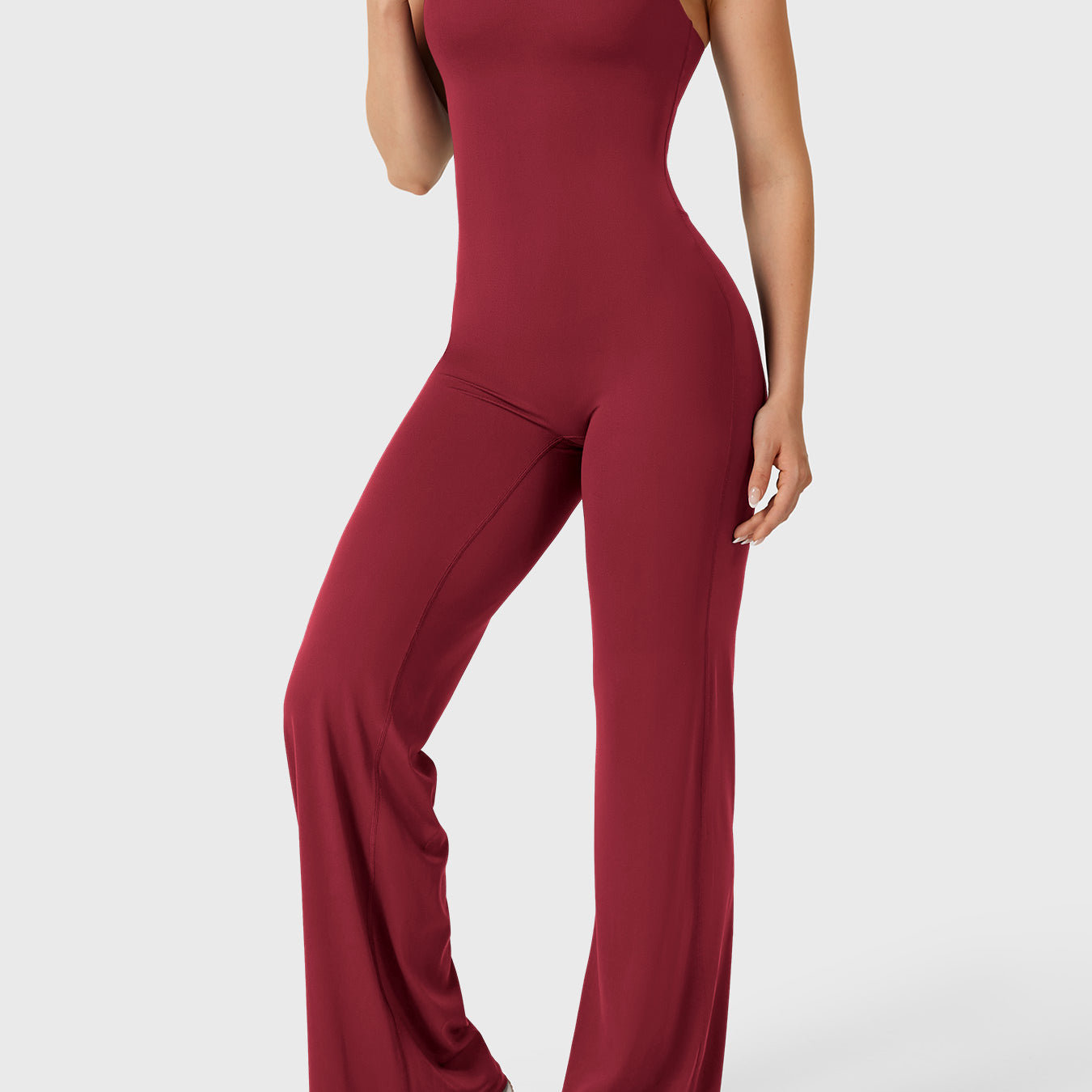 Dagyane Straight Leg Jumpsuit in anchor red, angled front pose, smooth abdominal area, streamlined silhouette, straight leg cut
