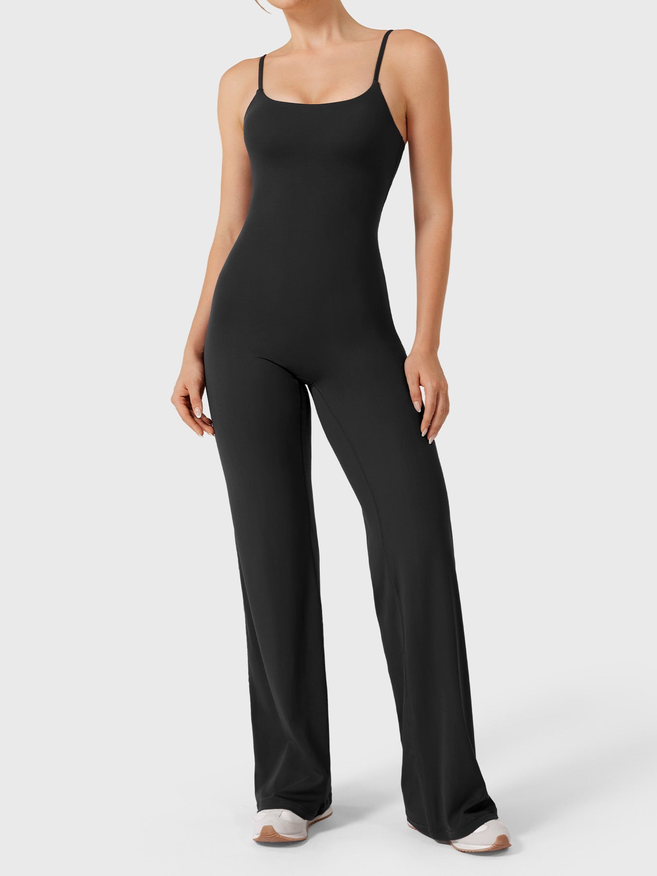 Dagyane Straight Leg Jumpsuit in black, front view standing, square neckline, seamless front, straight leg silhouette