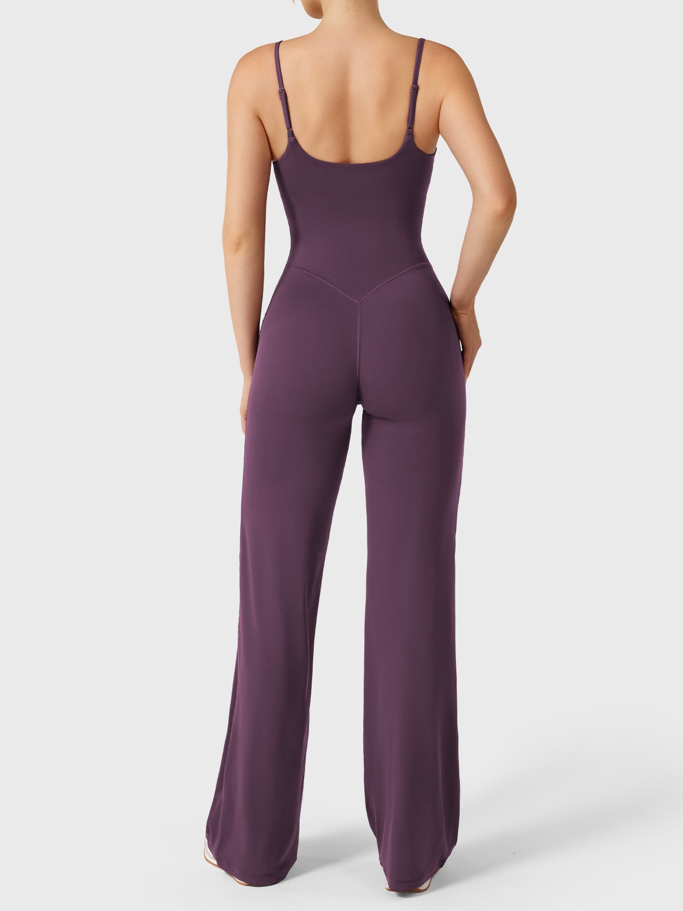 Dagyane Straight Leg Jumpsuit in black berry, back view model pose, open back design, adjustable straps, V-back shaping detail