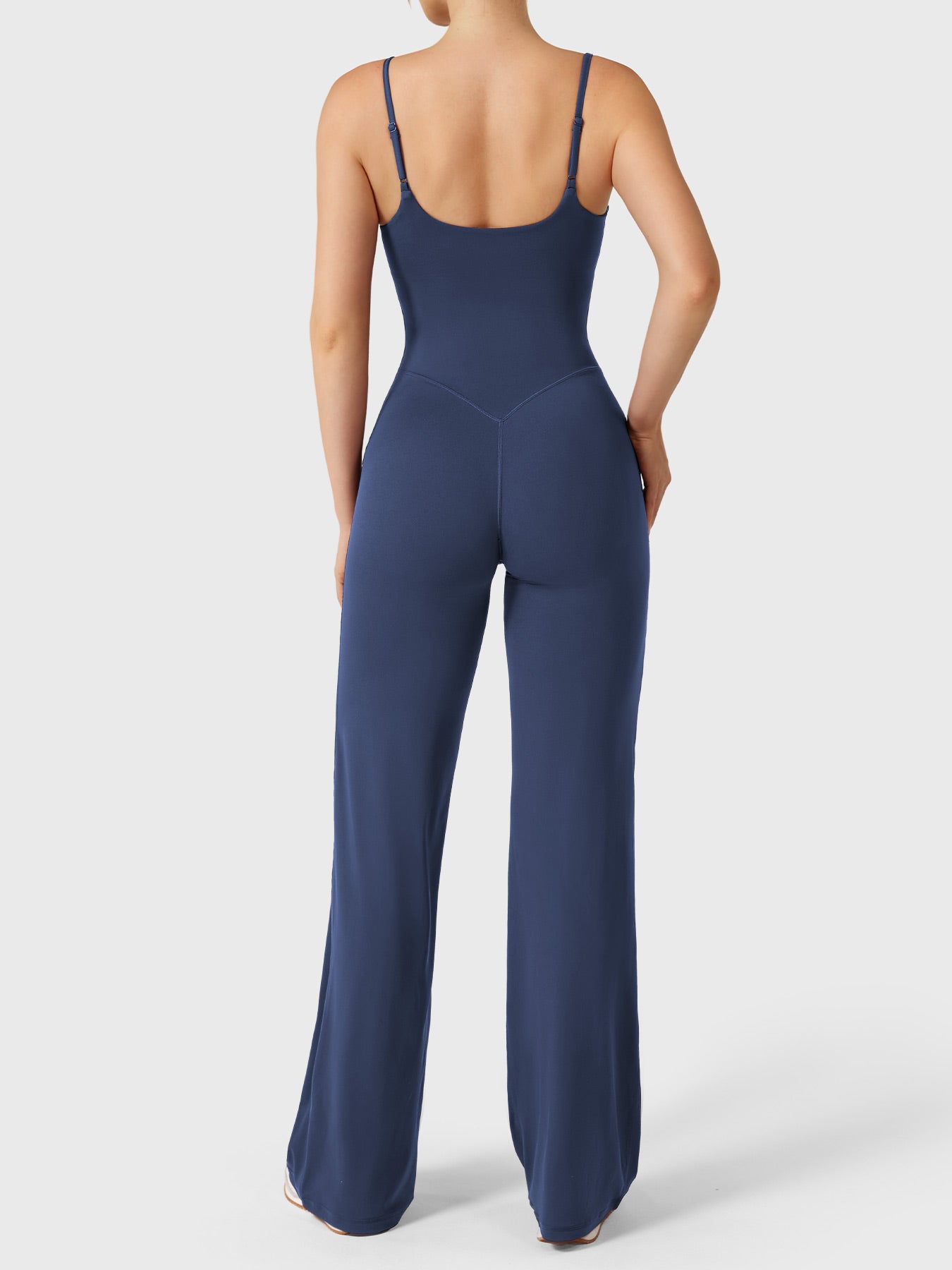 Dagyane Straight Leg Jumpsuit in navy, back view pose, open back design, adjustable straps, V-back detail enhancing curves