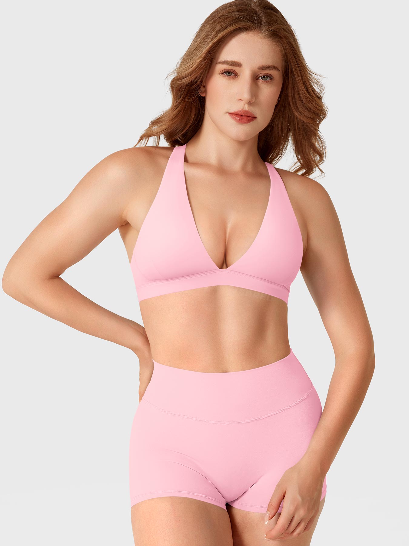 Baby Pink Yeoreo Wafiya V-neck sports bra front view styled with matching shorts, body-contouring fit