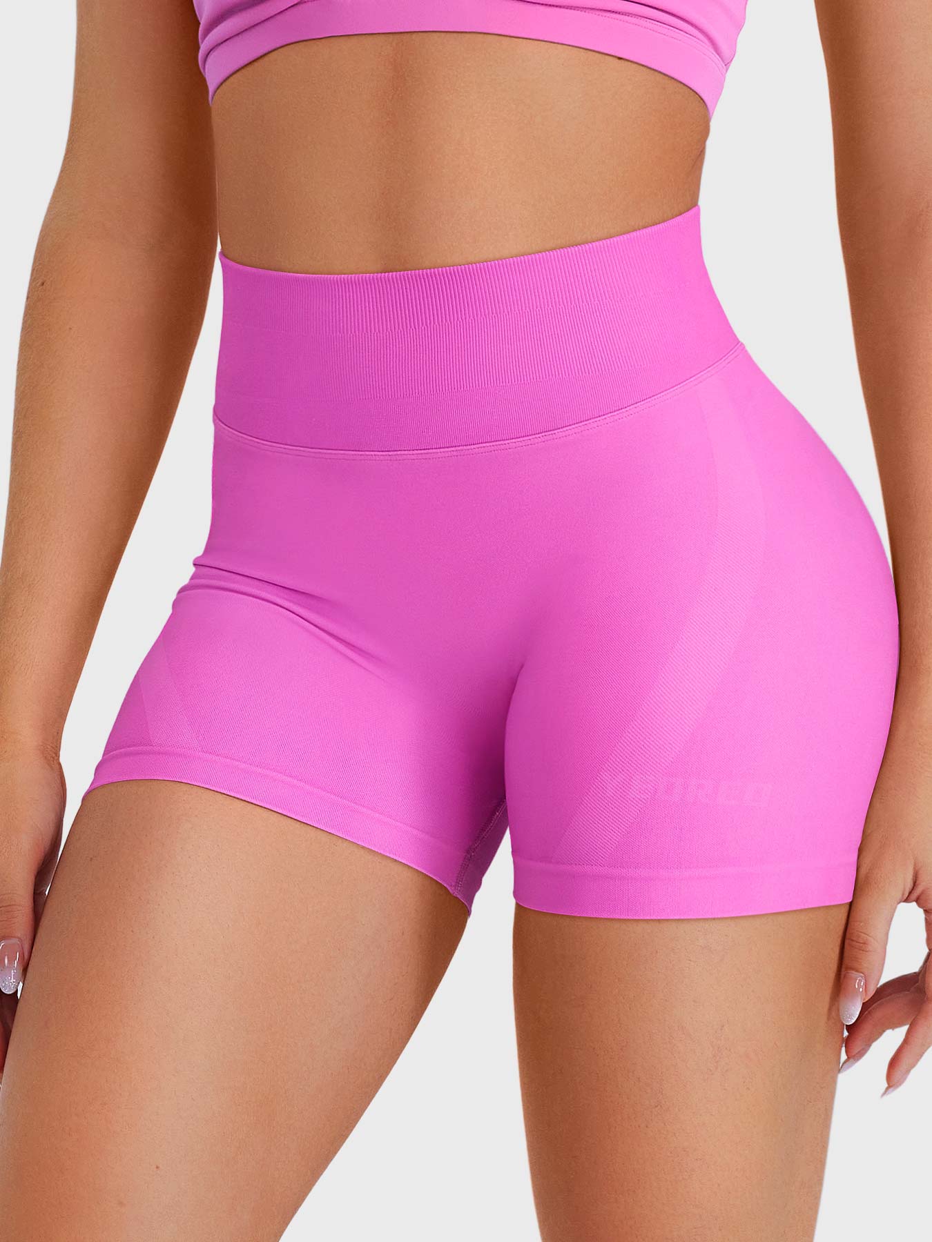 Flower Powder Baderiy 4.5" seamless shorts front view, high-rise waistband offering core support without front seam