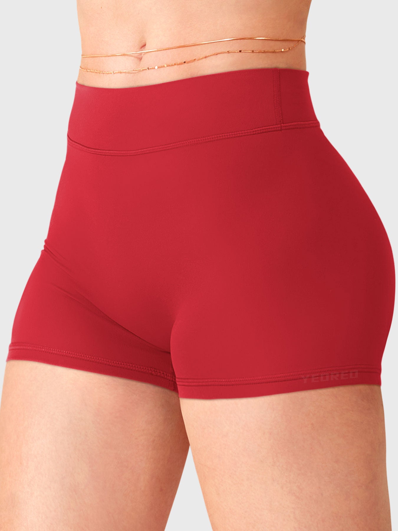 Red Yeoreo Zahida low rise shorts angled front view, double-layer waistband with no front seam design