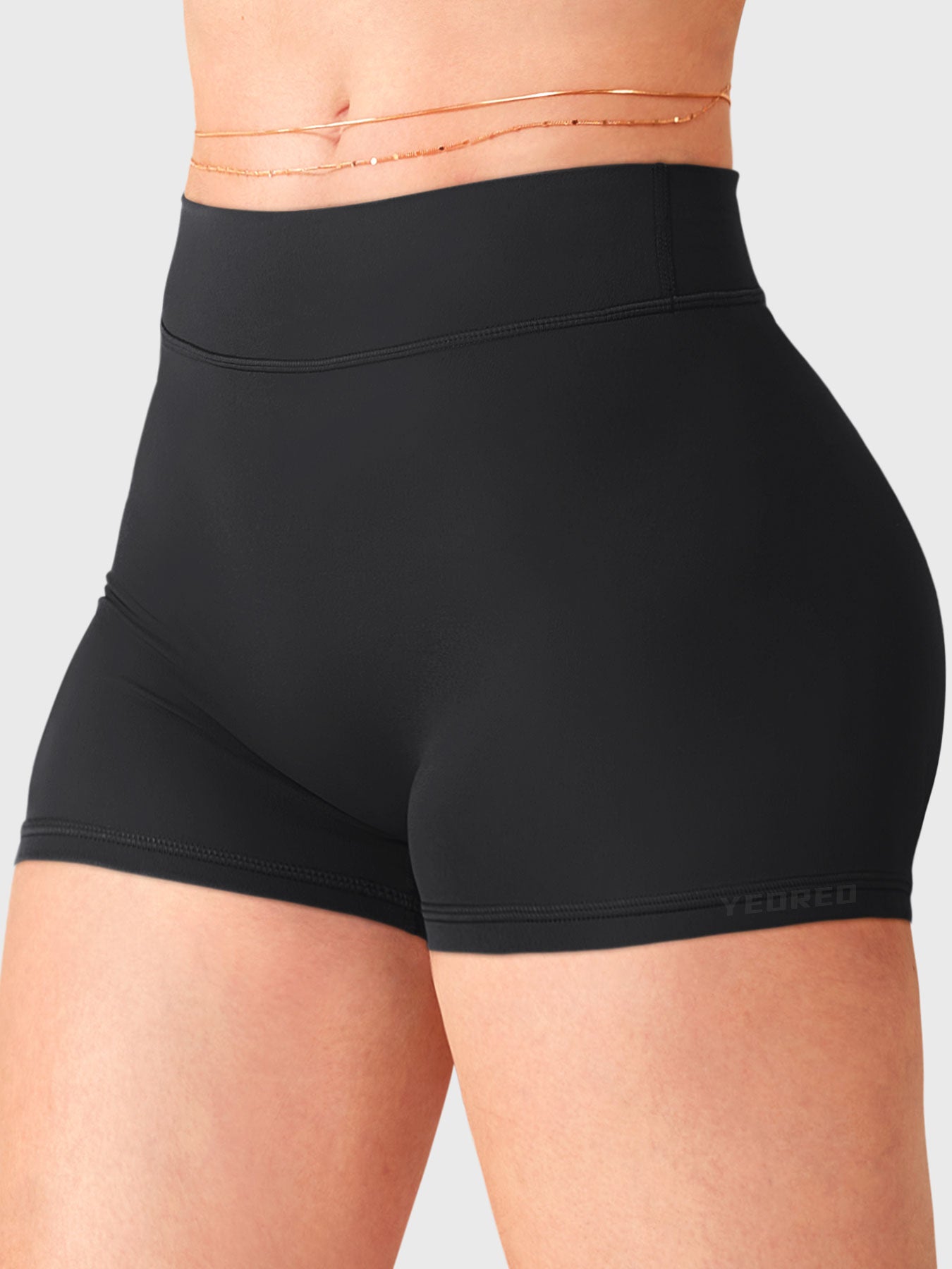 Black Yeoreo Zahida low rise shorts angled front view, double waistband and seamless front construction