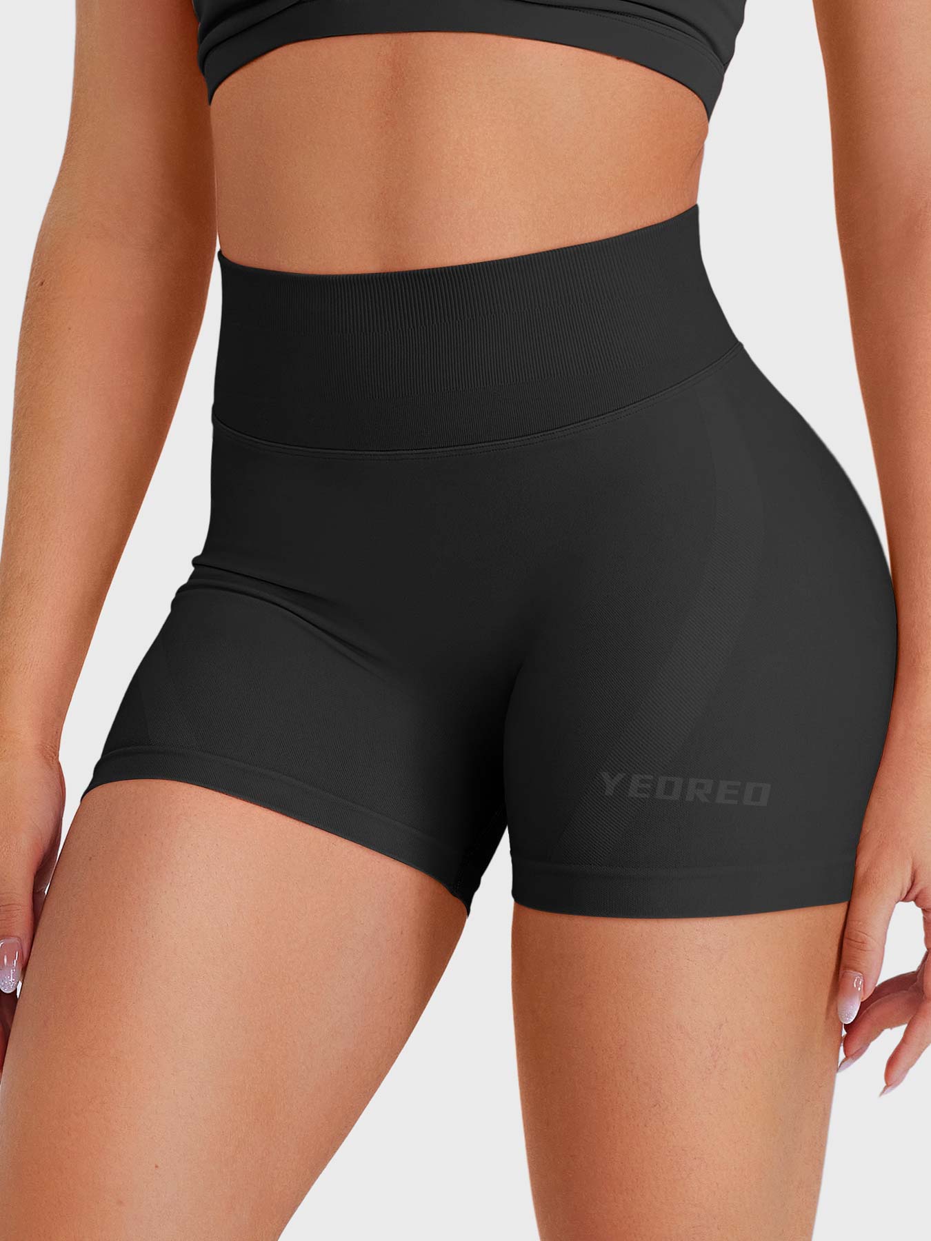 Black Baderiy 4.5" seamless shorts front angle, high-waisted seamless waistband with no front seam design