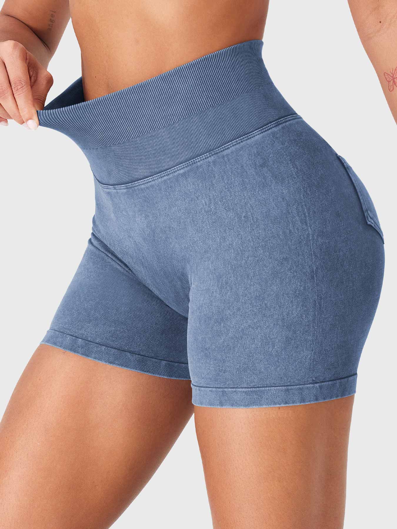 Side front view of Yeoreo Bridgie Faux Denim Seamless Shorts in Dark Blue – high elasticity and flex faux denim