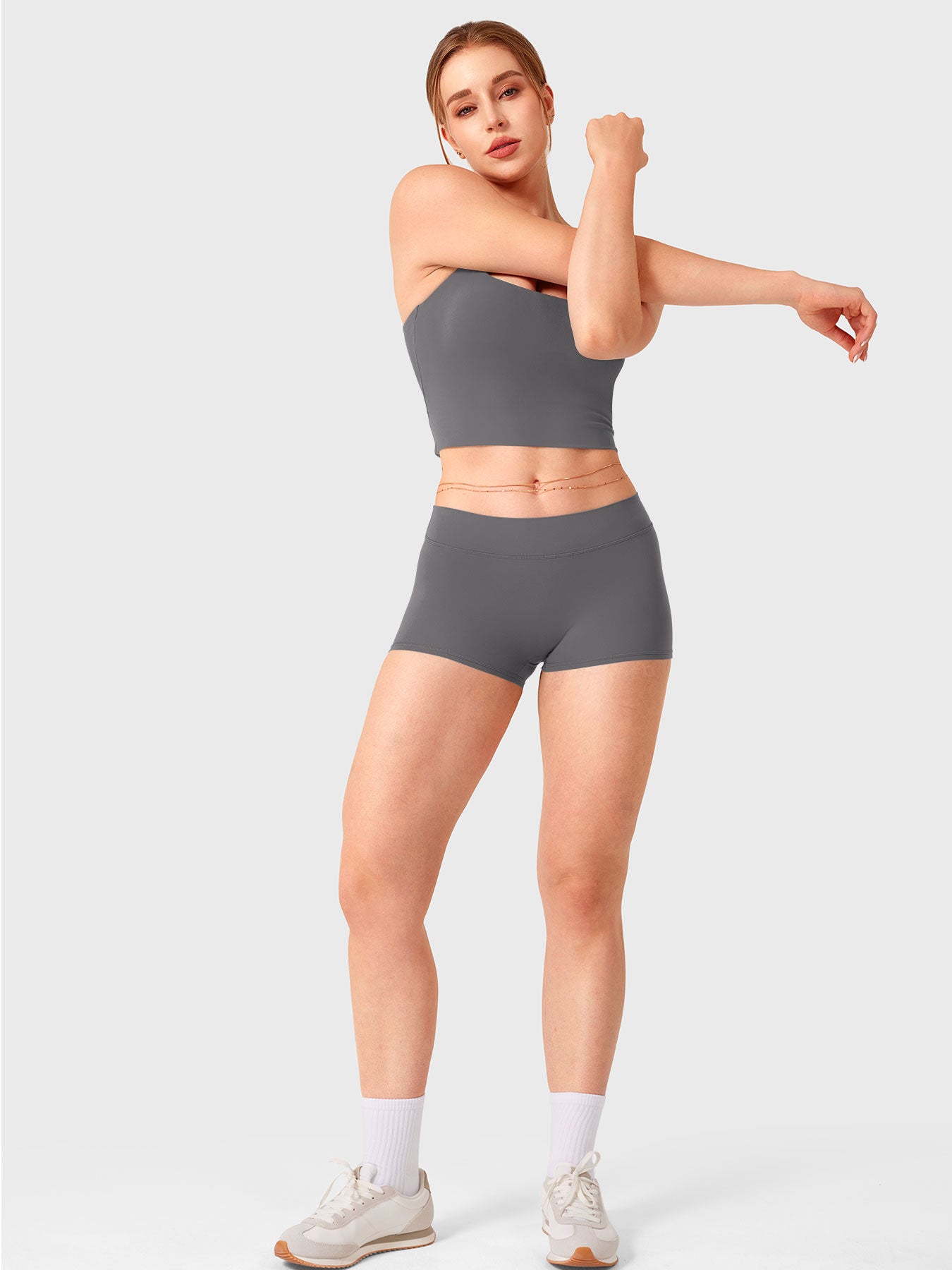 Dark Grey Yeoreo Zahida low rise shorts full length view styled with matching workout top