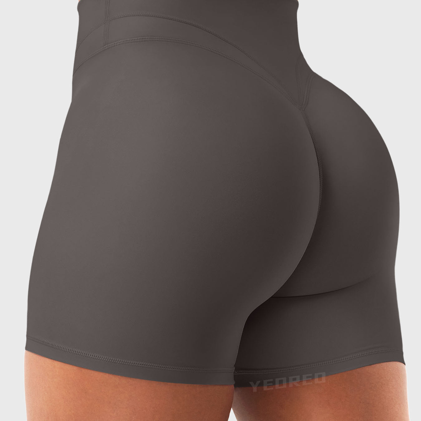 Side Back view of Yeoreo Almiy High Waisted Workout Shorts in Dark grey – V-stitch waistband and glute-lifting contour