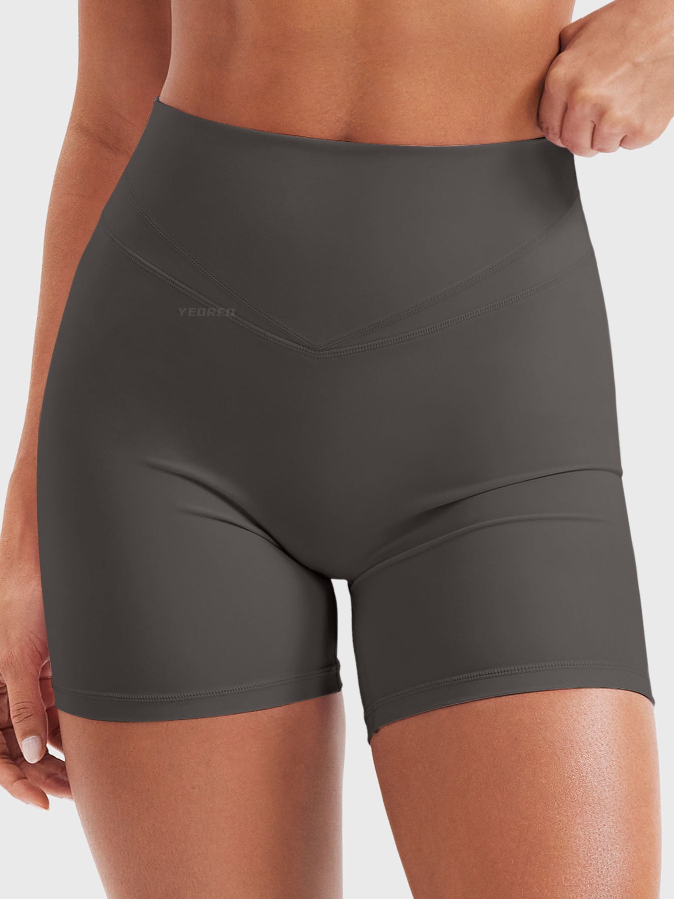Front view of Yeoreo Almiy High Waisted Workout Shorts in Dark grey– no front seam and flattering V-shape waistband