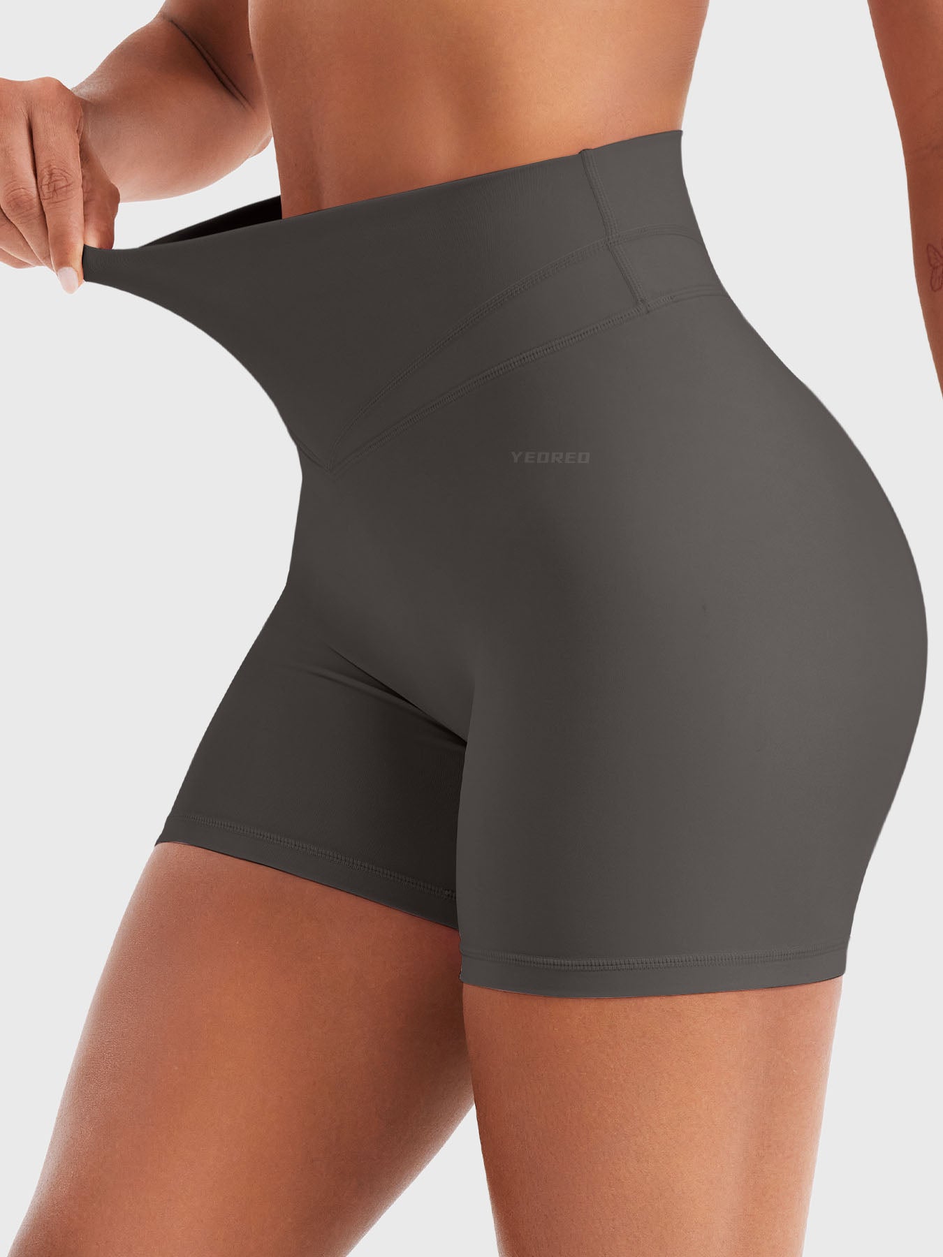 Side view of Yeoreo Almiy High Waisted Workout Shorts in Dark grey– stretchy waistband with tummy control