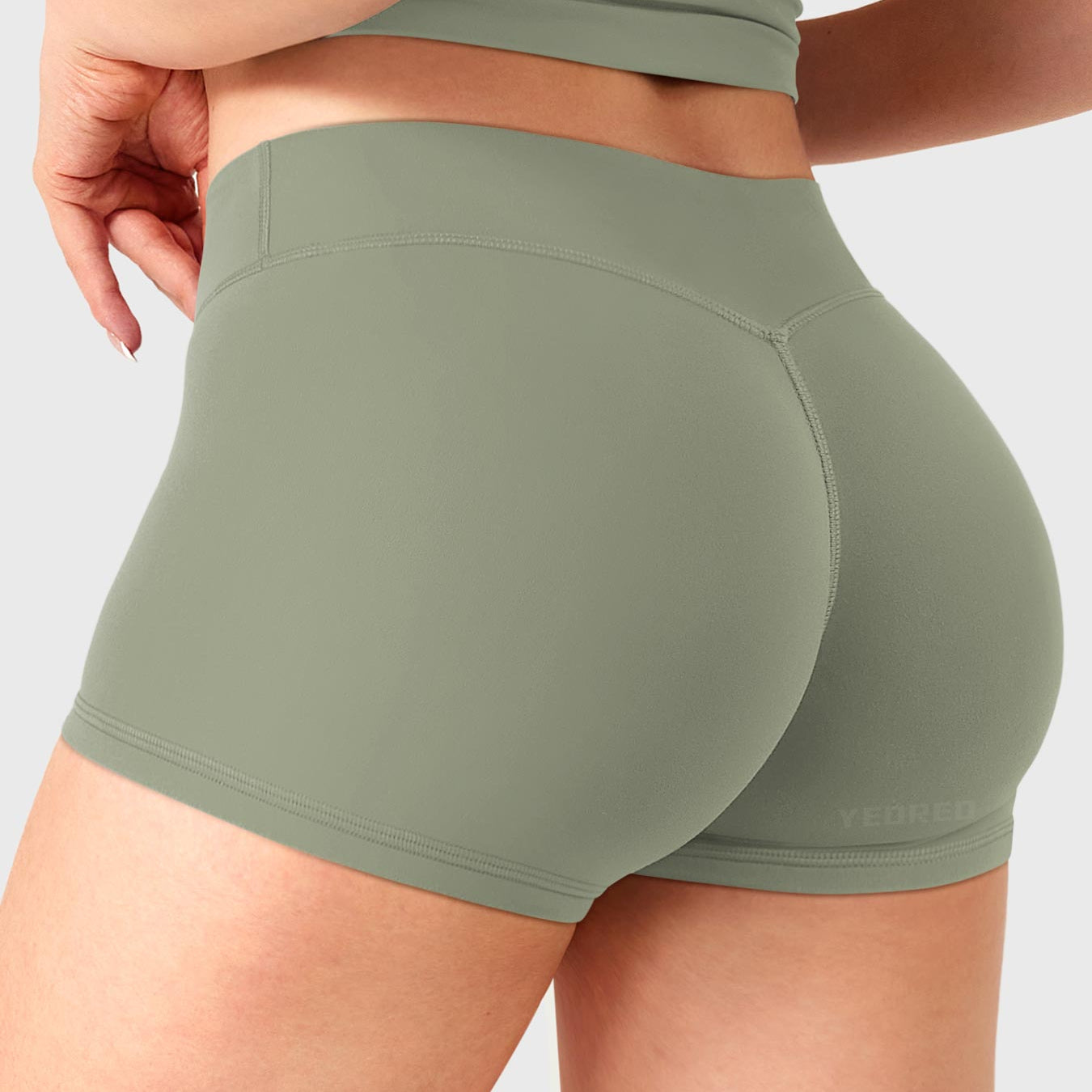 Grey Green Yeoreo Zahida 2.5 inch low rise shorts angled back view, V-back detail shaping natural curves