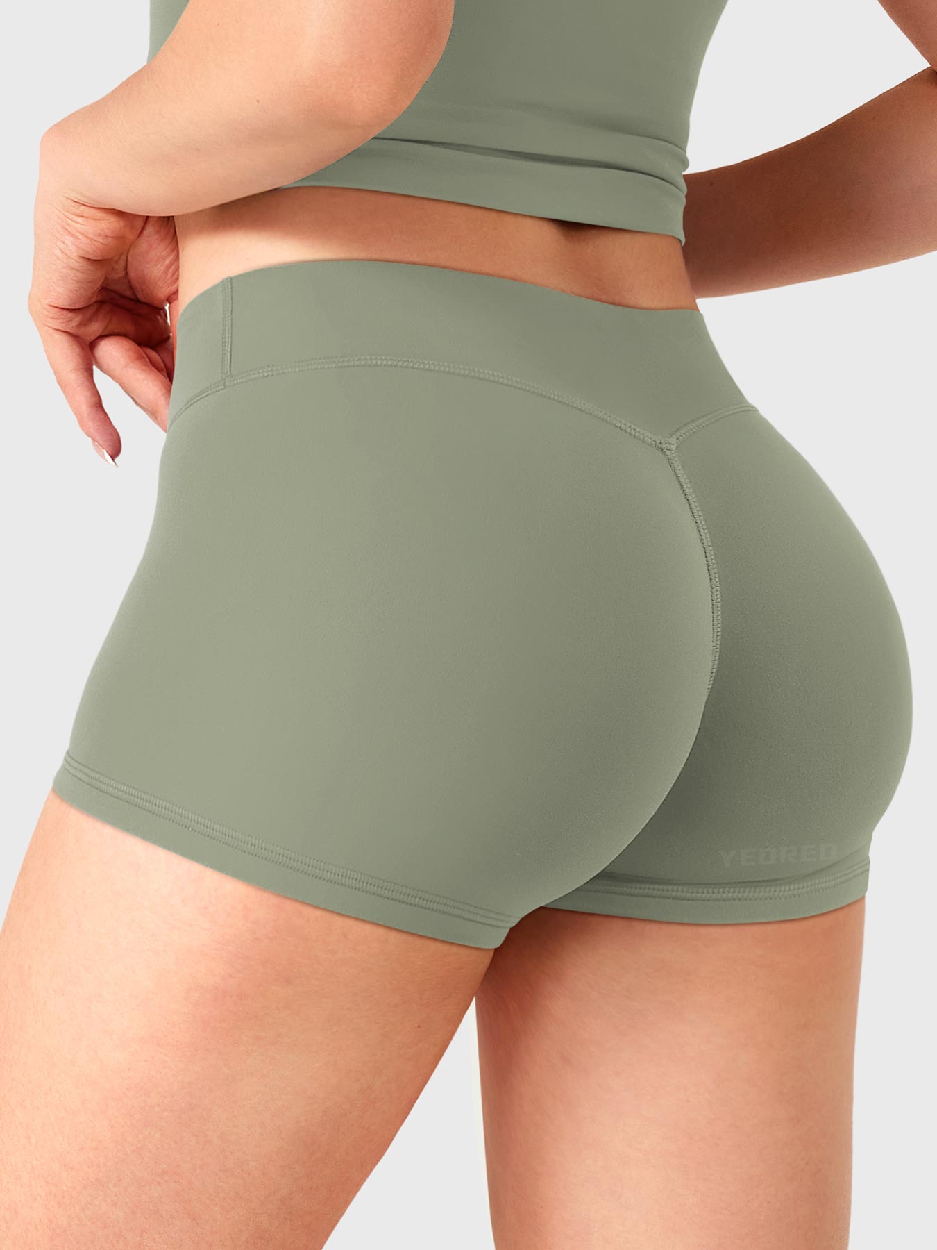 Grey Green Yeoreo Zahida 2.5 inch low rise shorts angled back view, V-back detail shaping natural curves