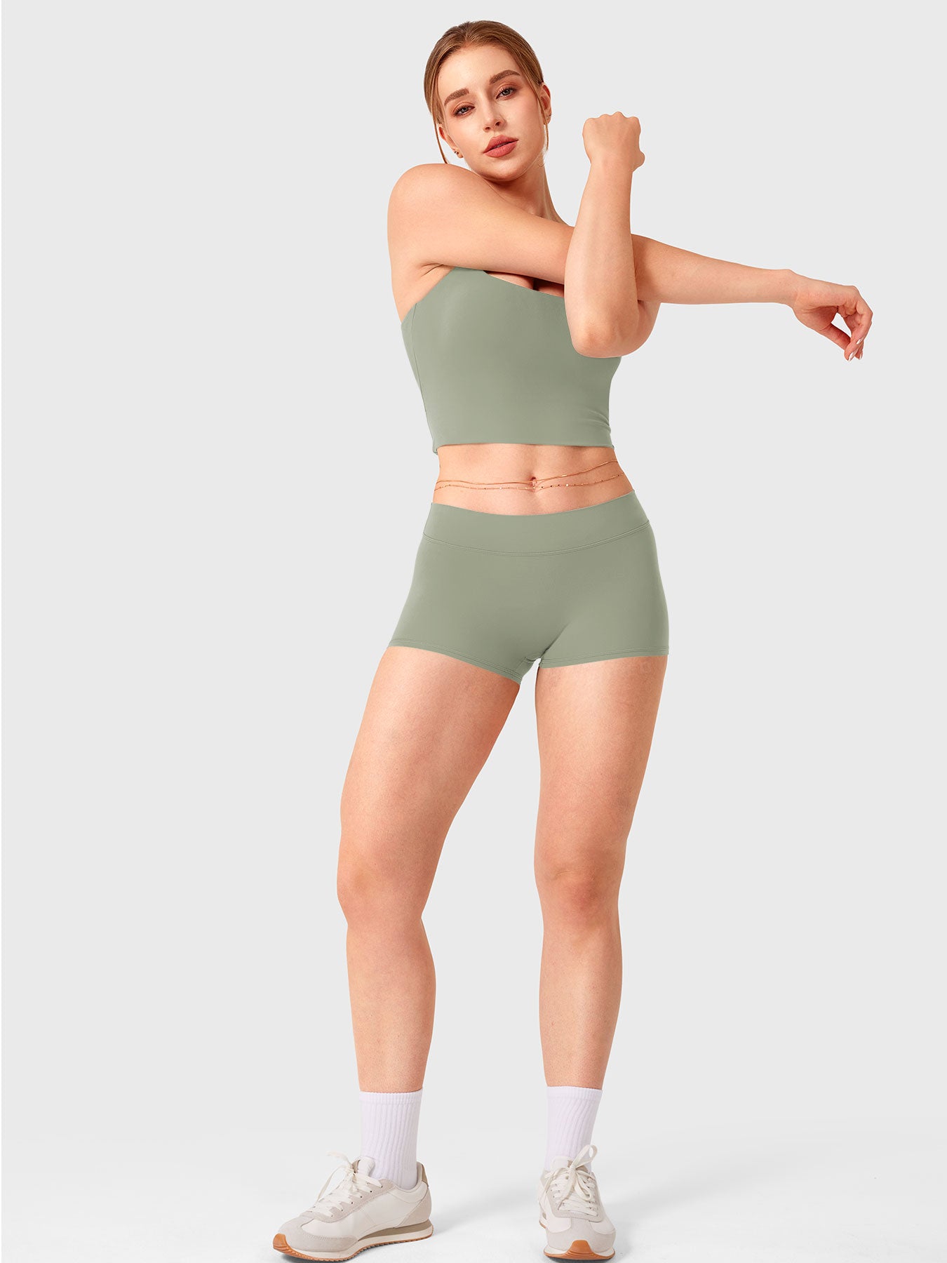 Grey Green Yeoreo Zahida low rise shorts full body view paired with matching tank for athletic look