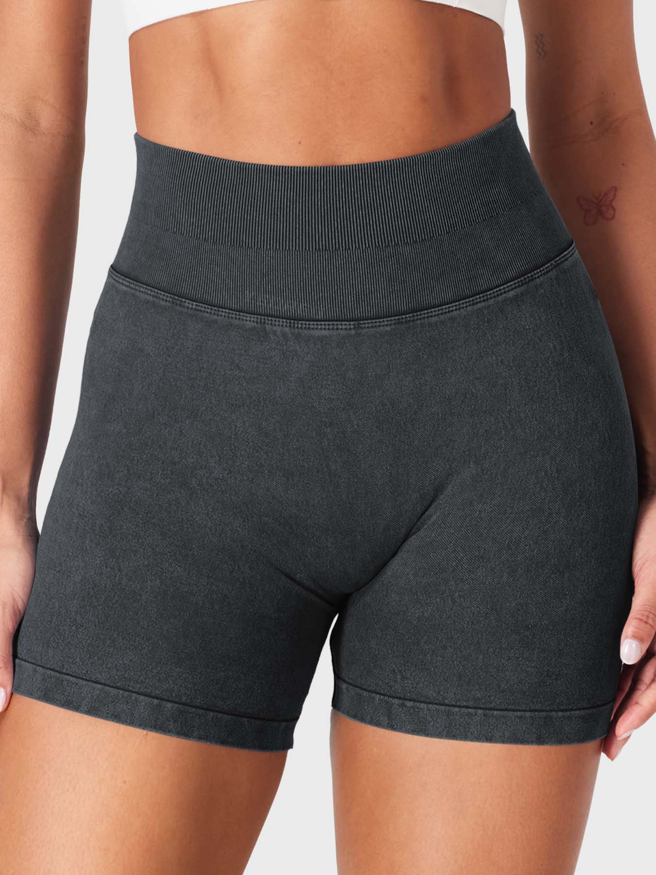 Front view of Yeoreo Bridgie Faux Denim Seamless Shorts in black– no front seam