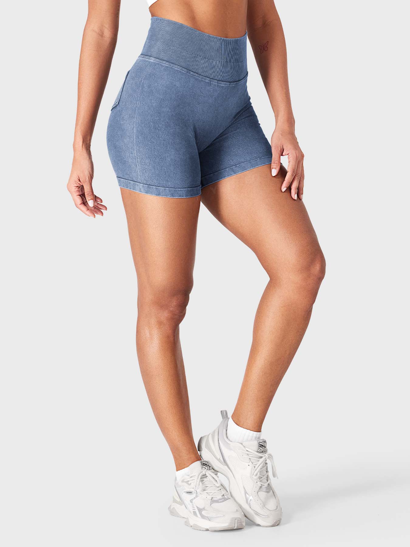 Full Side front view of Yeoreo Bridgie Faux Denim Seamless Shorts in Dark Blue– tummy control