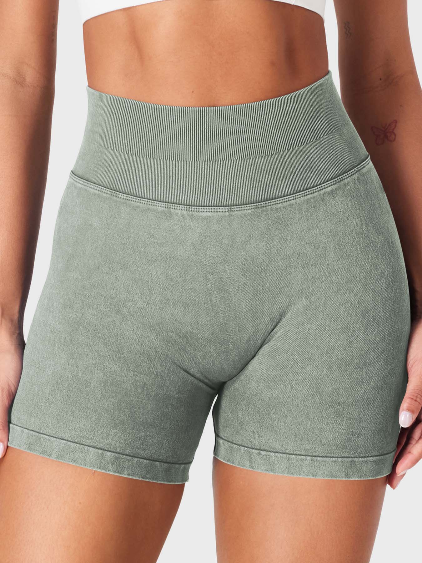 Front view of Yeoreo Bridgie Faux Denim Seamless Shorts in Khaki– no front seam