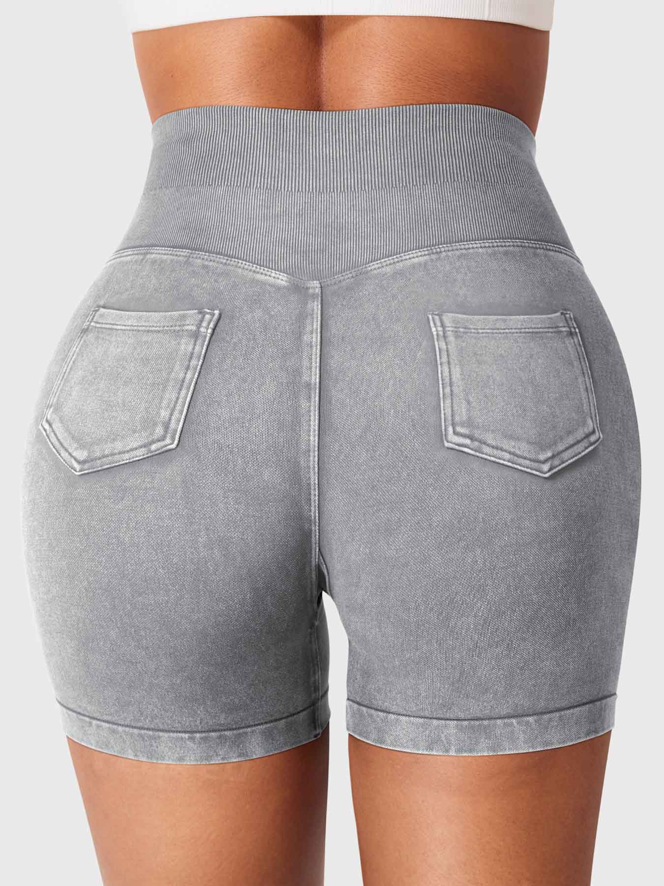 Back view of Yeoreo Bridgie Faux Denim Seamless Shorts in light grey– cargo pockets and full peach-lift effect