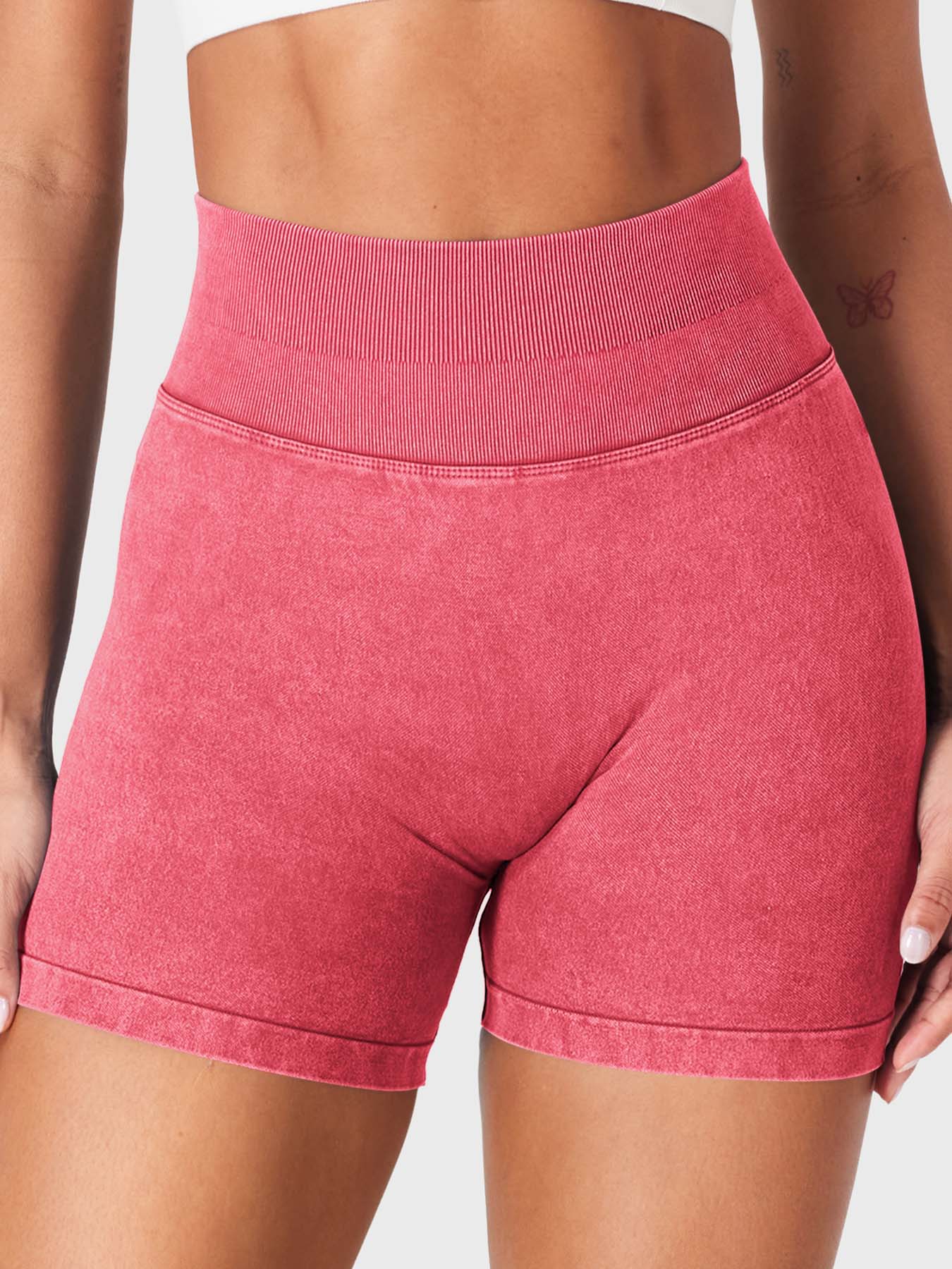Front view of Yeoreo Bridgie Faux Denim Seamless Shorts in Tile Red– no front seam