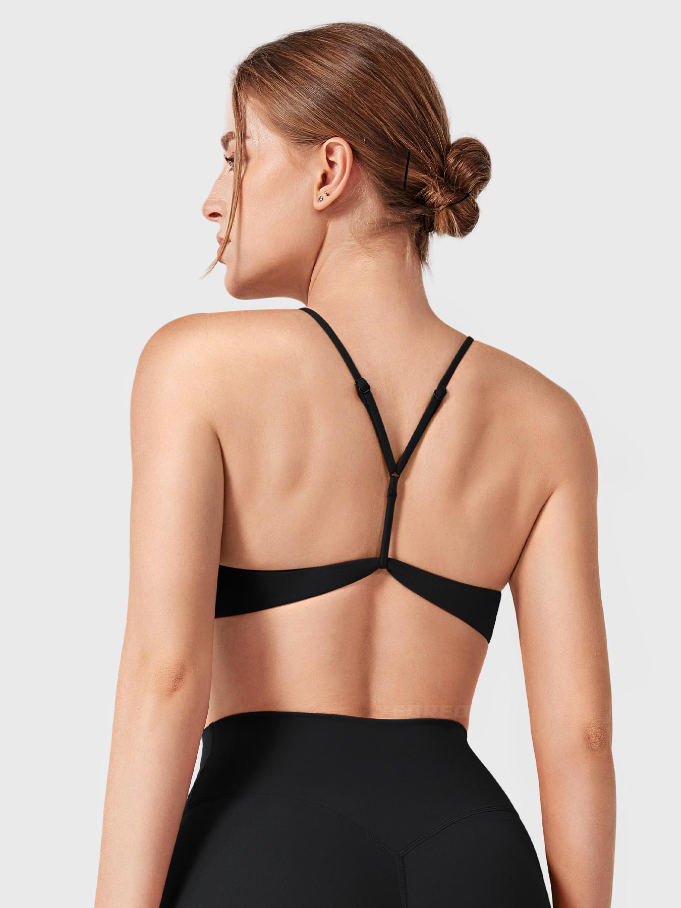 Black Yeoreo Zaahira adjustable sports bra back view, Y-back strap with adjustable fit for secure support
