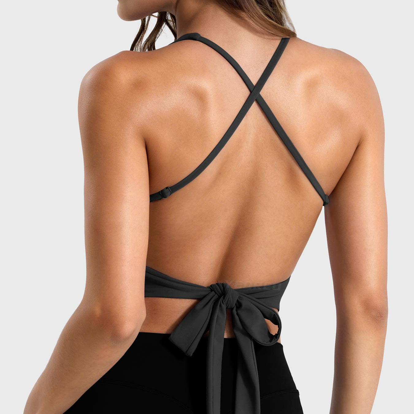 Black Yeoreo Kagina backless tie back active tank back view, open back with adjustable tie bow and spaghetti straps