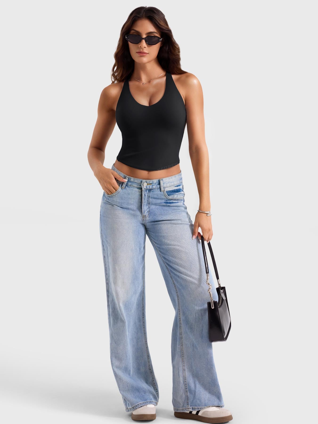 Black Yeoreo Kagina active tank full body view, versatile athleisure styling with a fitted silhouette