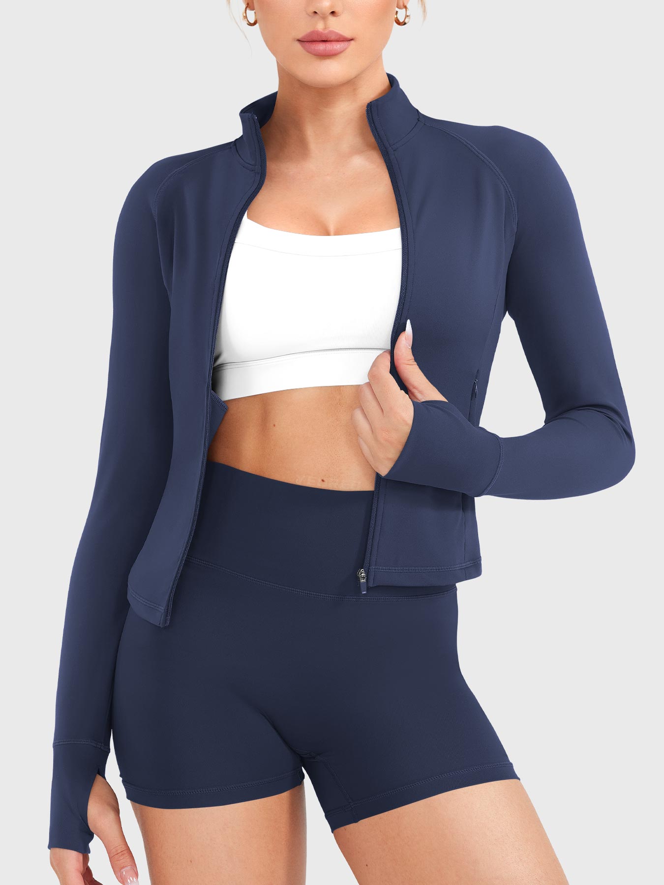 Candecy Full Zip Workout Jacket in navy, front view with zipper open, relaxed and breathable layering style