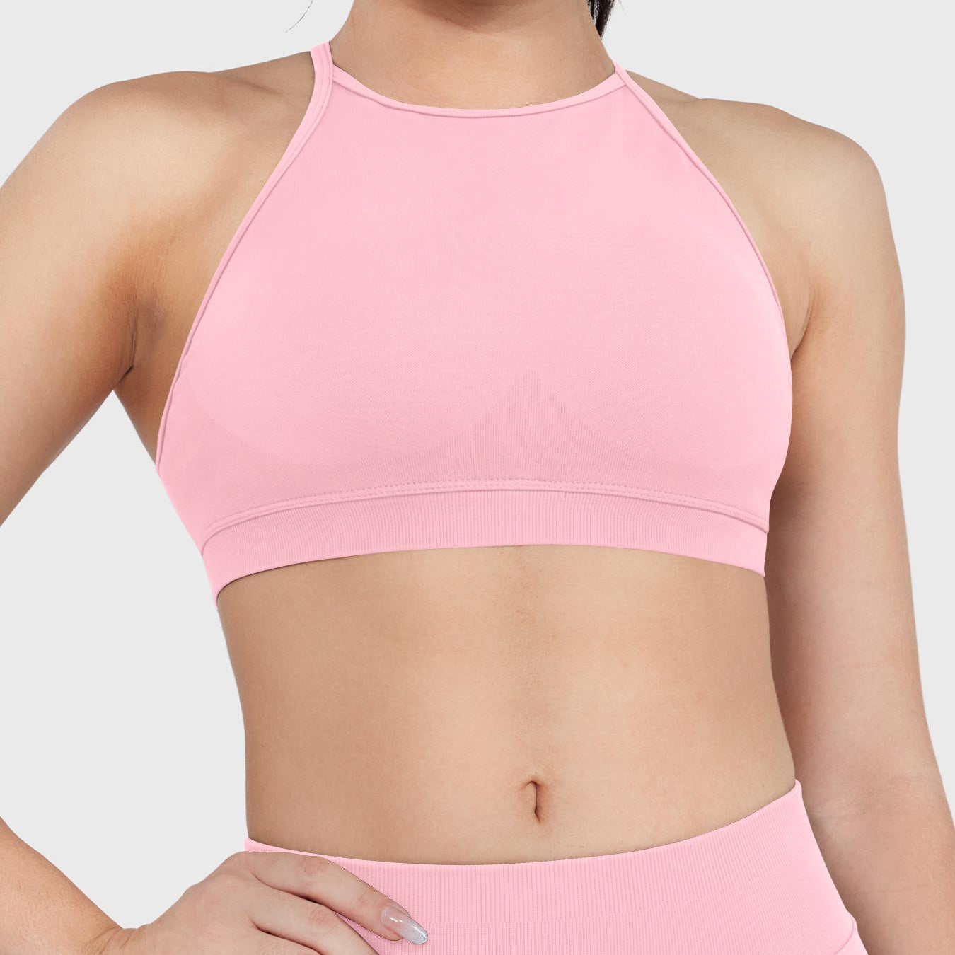 Acuffny High Neck Backless Sports Bra in pink, front view upper body, high neckline, ribbed elastic band, secure and supportive coverage