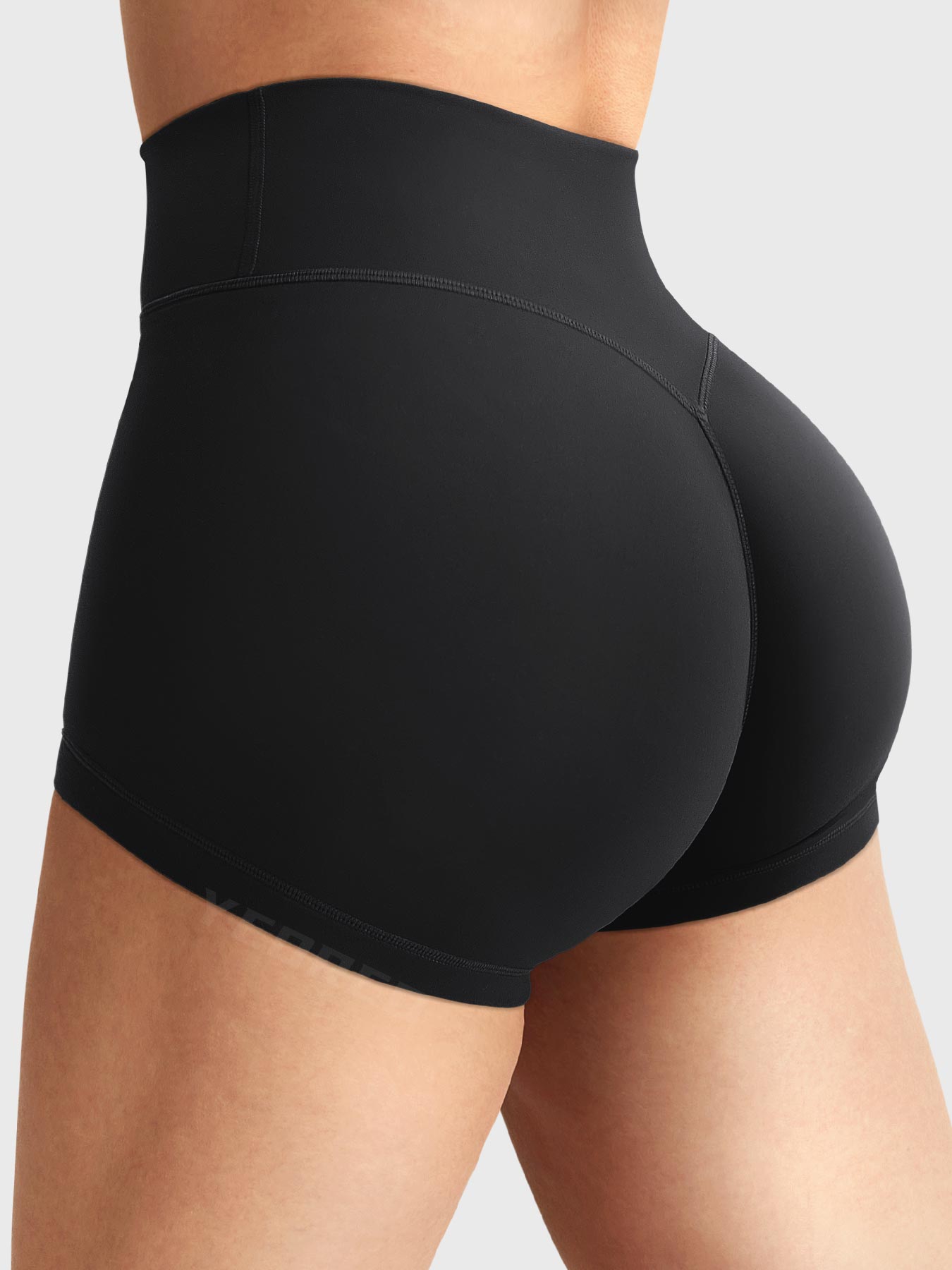 Side-back view close-up of Yeoreo Elysina 2.5" Running Shorts in black showing hidden scrunch butt and high rise