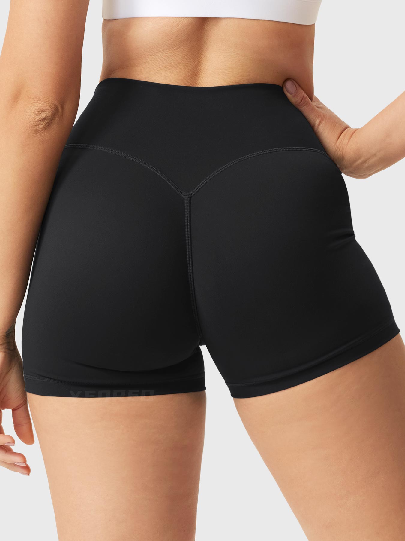 Back view of Yeoreo Elysina 2.5" Running Shorts in black highlighting scrunch design
