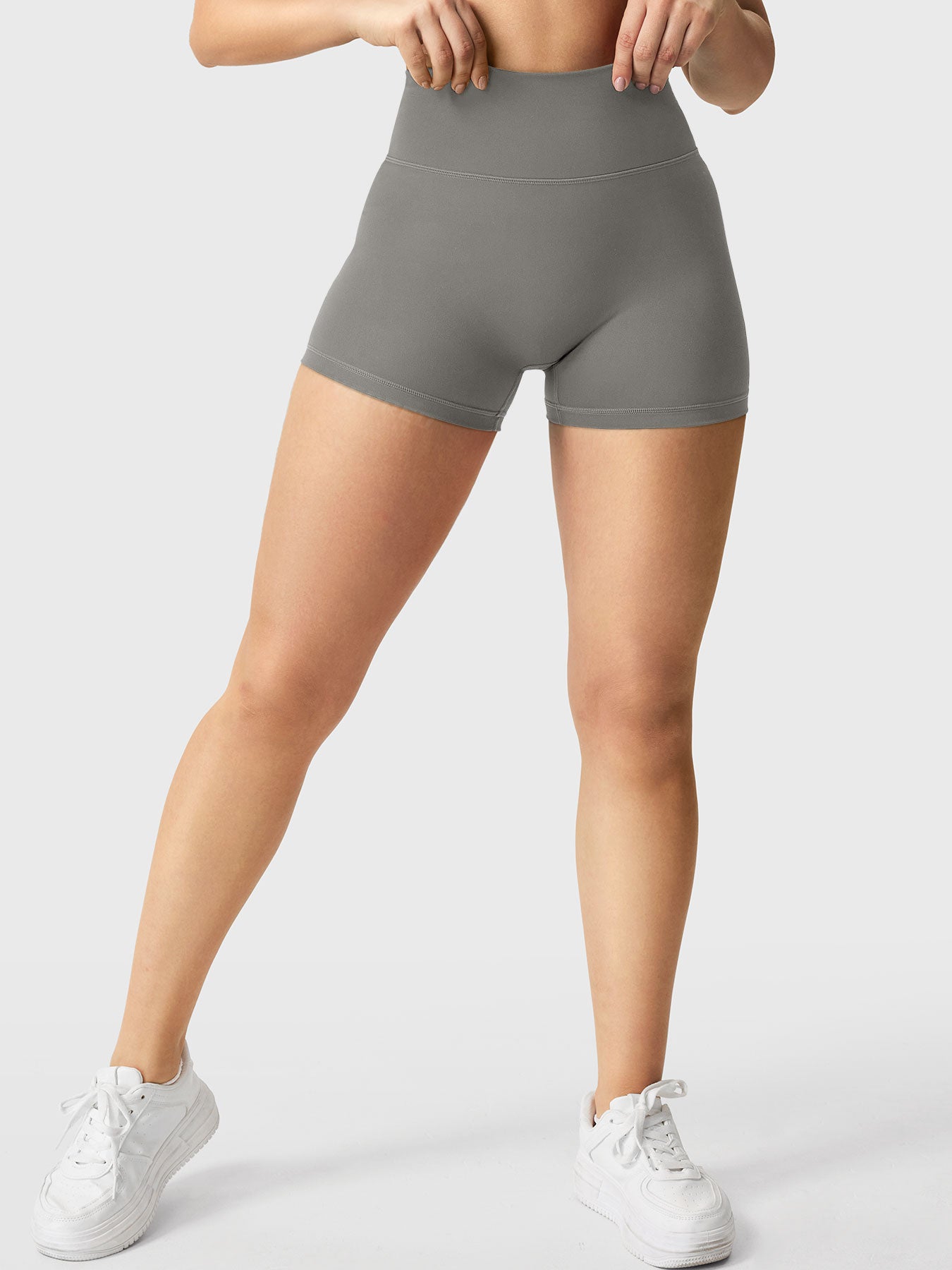 Full-length front view of Yeoreo Elysina 2.5" Running Shorts in Dark Grey showing fit and coverage
