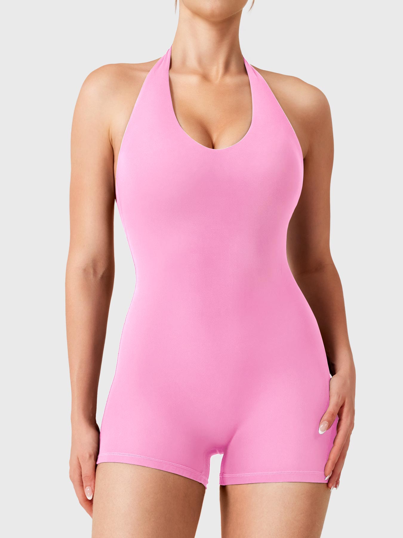 Light Pink Yeoreo Daiane halter neck romper front view, U neckline with body contouring fit and 2.5 inch inseam