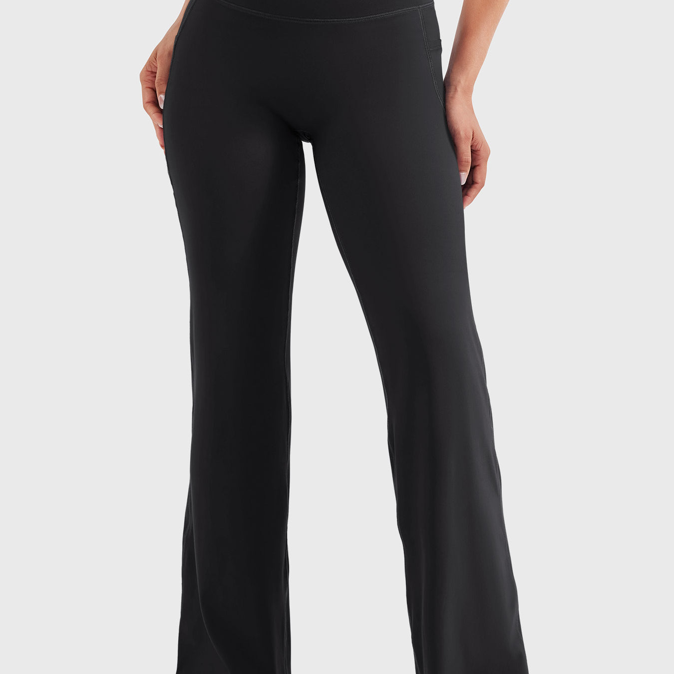 Black high waisted straight leg leggings with pockets, no front seam design for smooth fit