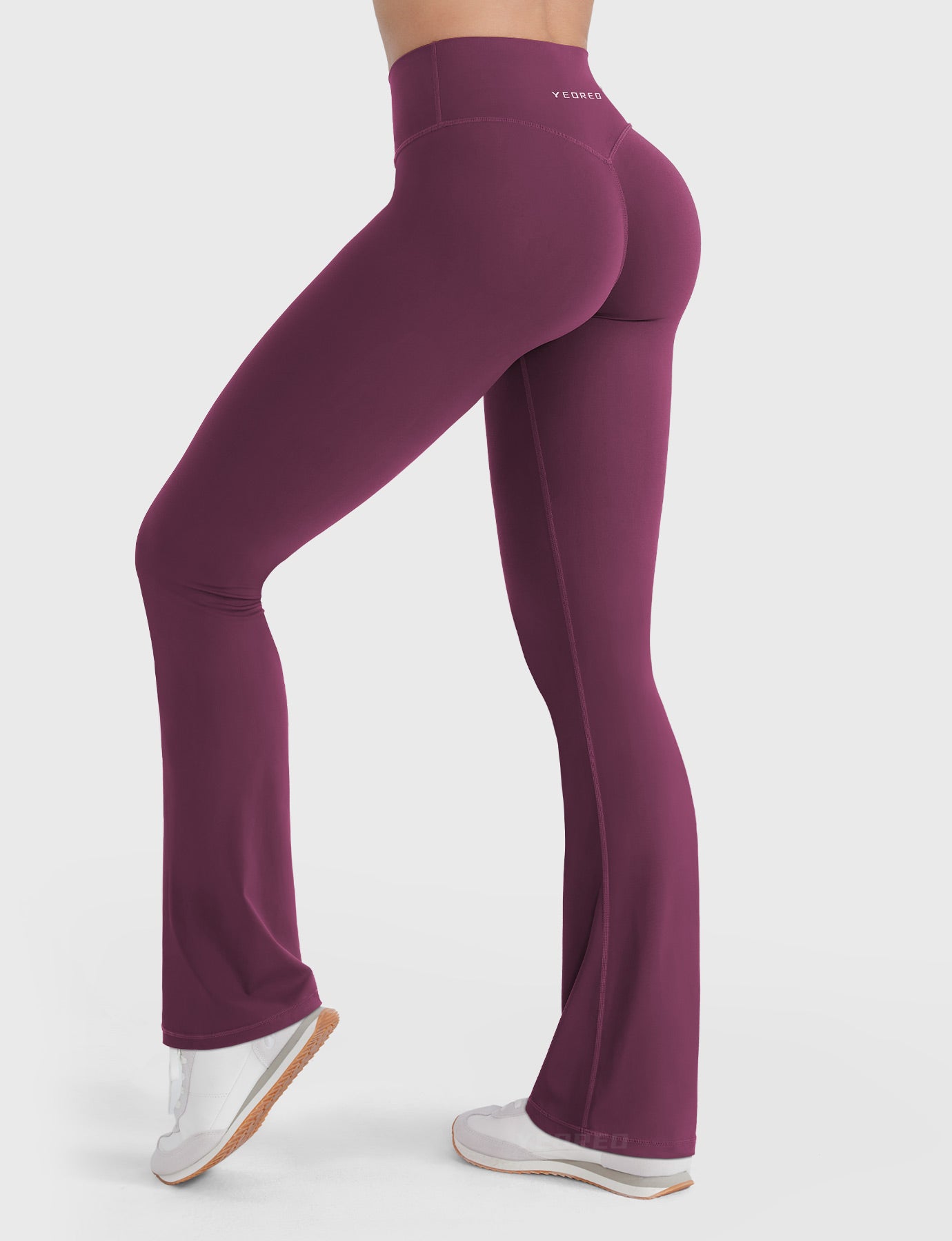 Deep Cherry Red V-back booty-lift mini flare leggings, angled back pose