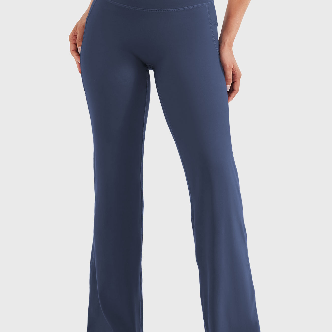 Navy high waisted straight leg leggings with pockets, no front seam flattering front view