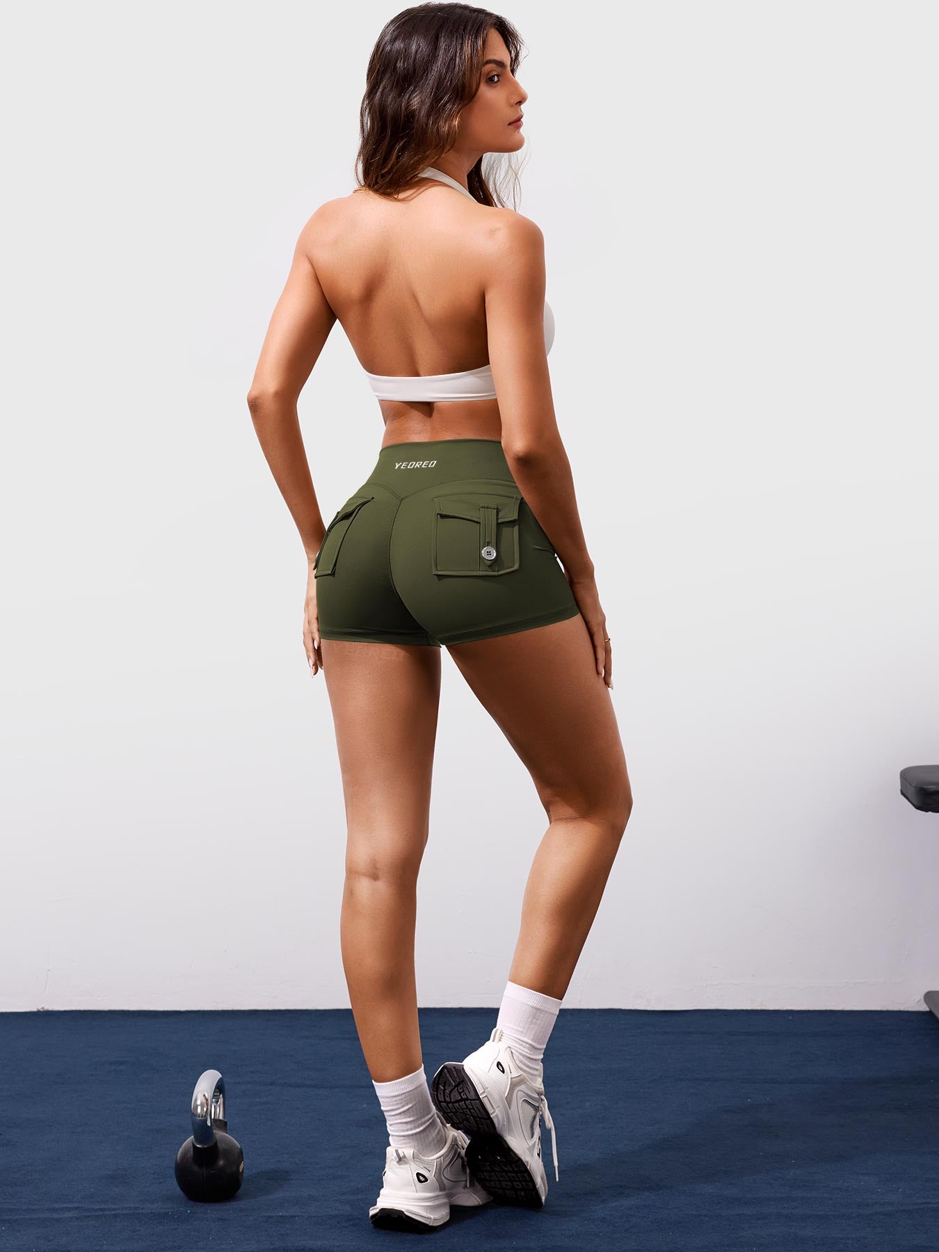 Army Green Yeoreo Darilya CoreFlex cargo shorts full body view, athletic cargo shorts styled for gym training