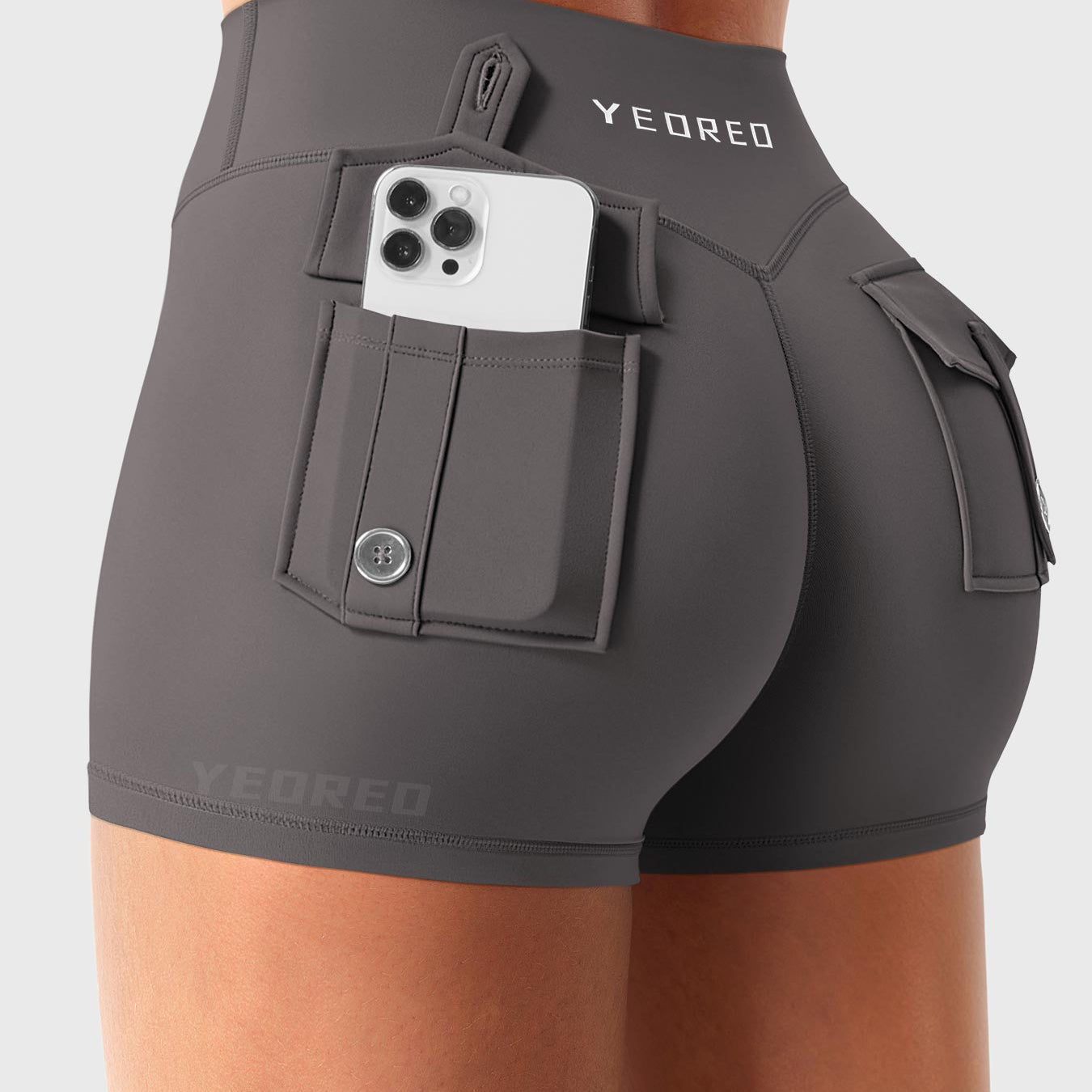 Dark Grey Yeoreo Darilya CoreFlex low rise cargo shorts angled back view, dual back cargo pockets sized for phone storage