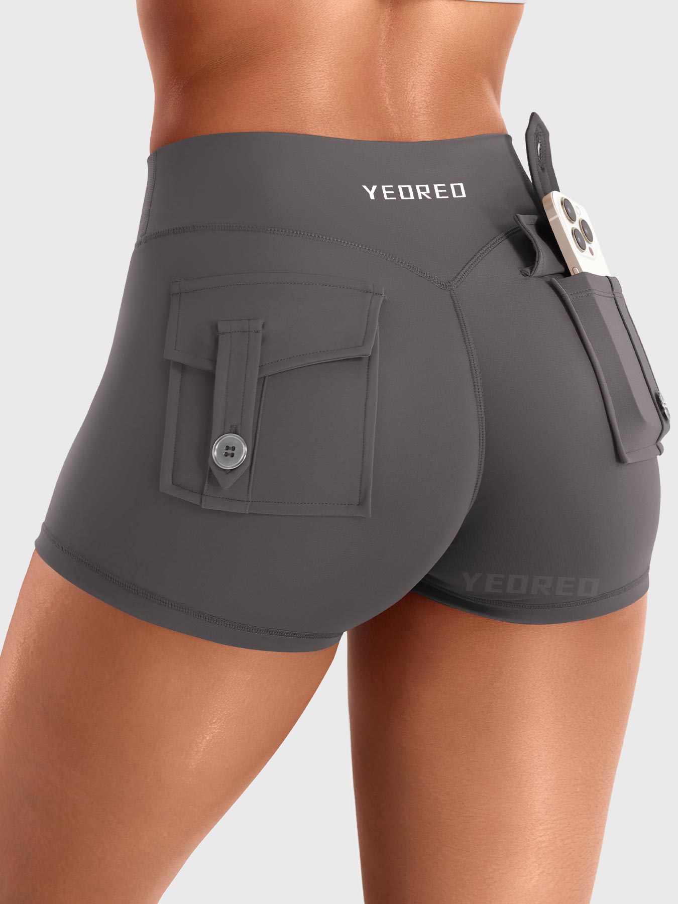 Dark Grey Yeoreo Darilya CoreFlex Y2K cargo shorts angled back view, flap cargo pockets with utility-inspired style