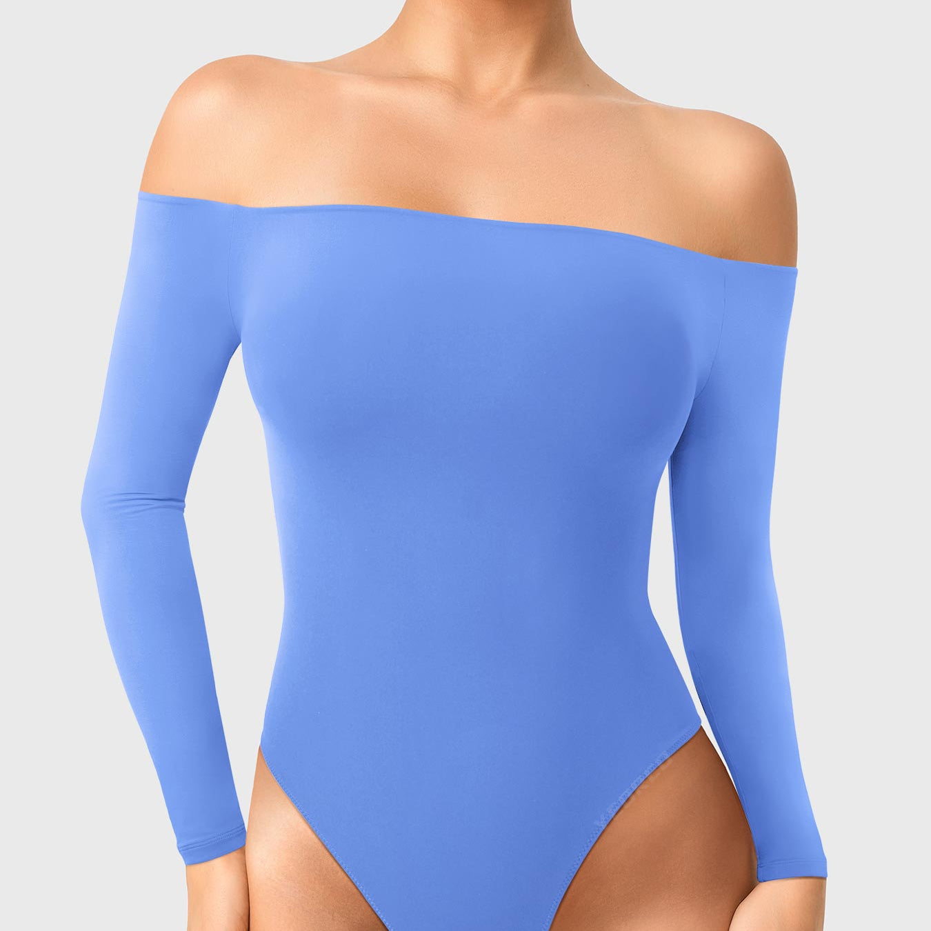 Dacrly Off Shoulder Bodysuit in blue, front view standing, off shoulder neckline, smooth and fitted silhouette