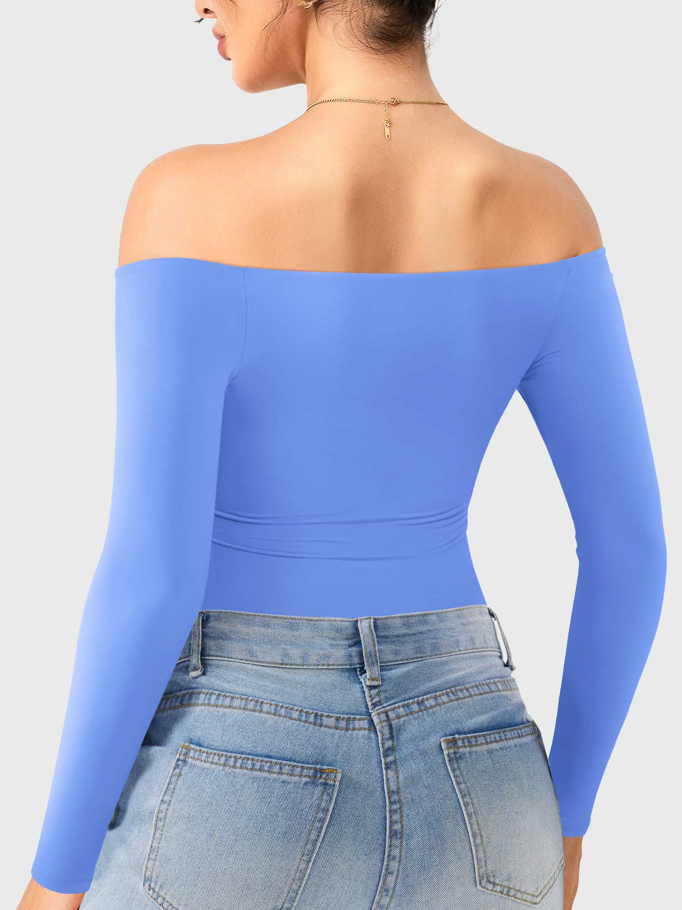 Dacrly Off Shoulder Bodysuit in blue, back view layered with jeans, slim fit bodysuit for everyday street wear