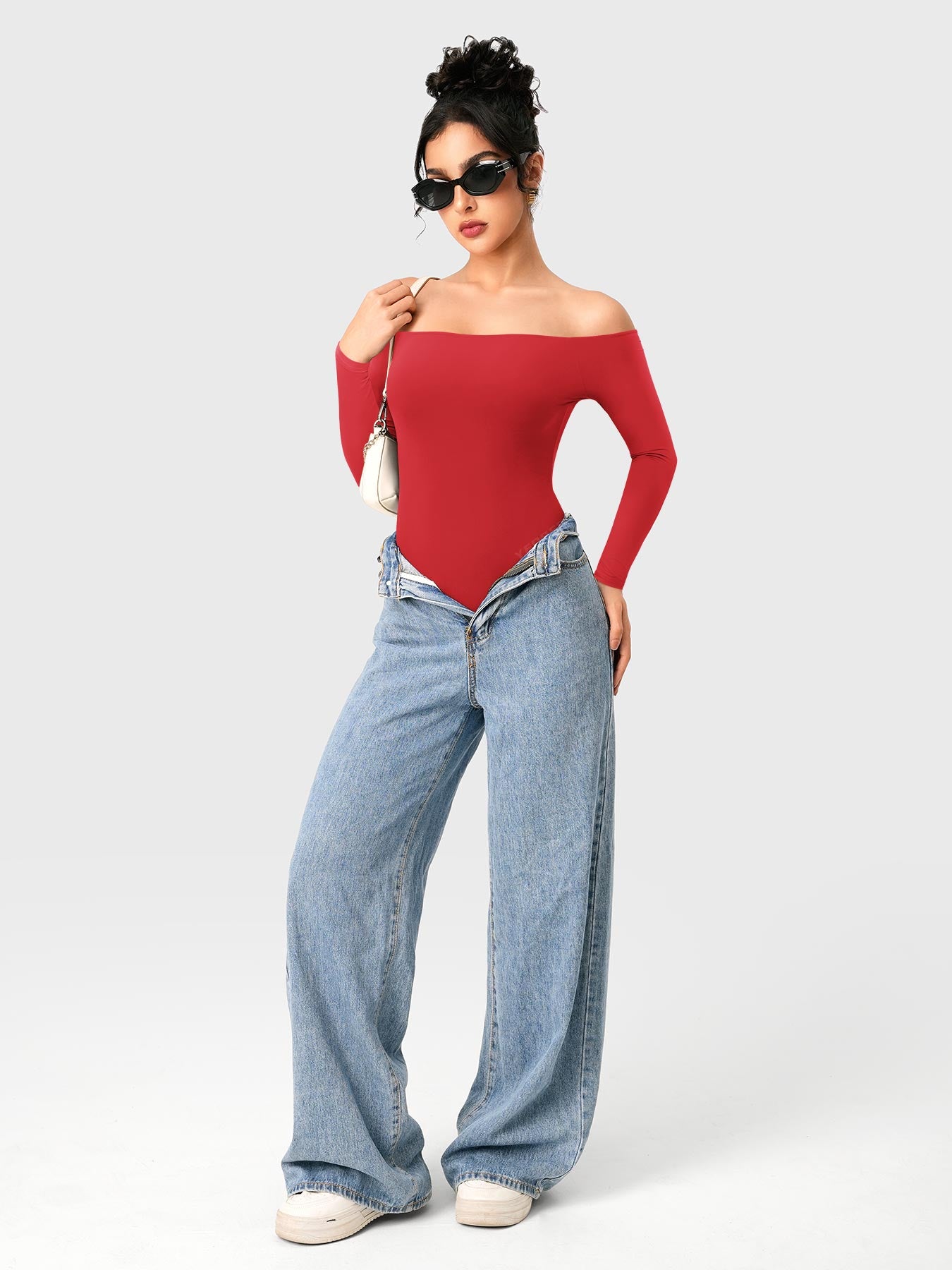 Dacrly Off Shoulder Bodysuit in red, full body front view layered with jeans, styled with sunglasses and shoulder bag, Y2K street outfit