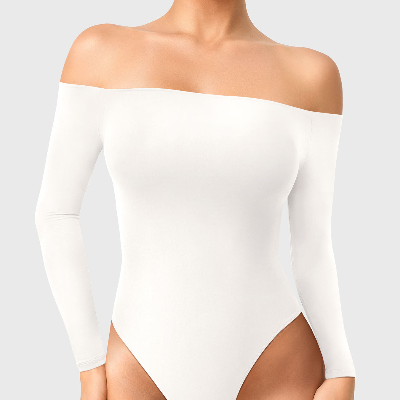 Dacrly Off Shoulder Bodysuit in white, front view standing, off shoulder neckline, clean and fitted silhouette