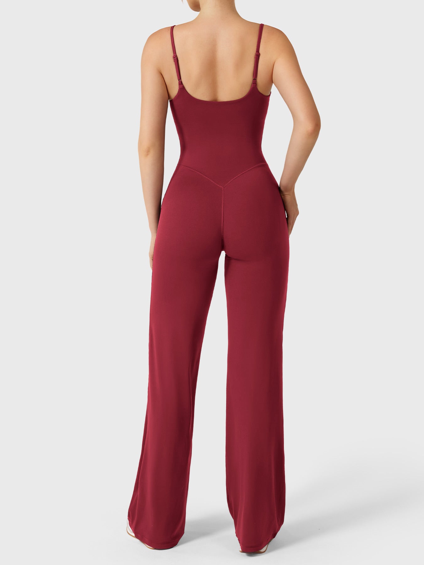 Dagyane Straight Leg Jumpsuit in anchor red, back pose, open back, adjustable straps, V-back contour enhancing glutes