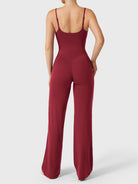 Dagyane Straight Leg Jumpsuit in anchor red, back pose, open back, adjustable straps, V-back contour enhancing glutes