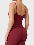 Dagyane Straight Leg Jumpsuit in Anchor Red, back view close-up focusing on upper body, open back design, adjustable shoulder straps, V-back detail lifting and shaping glutes