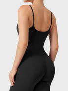 Dagyane Straight Leg Jumpsuit in black, back view close-up focusing on upper body, open back design, adjustable shoulder straps, V-back detail lifting and shaping glutes