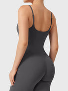 Dagyane Straight Leg Jumpsuit in Dark Grey, back view close-up focusing on upper body, open back design, adjustable shoulder straps, V-back detail lifting and shaping glutes