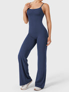 Dagyane Straight Leg Jumpsuit in navy, angled front pose, smooth tummy area, clean silhouette, flattering leg shape