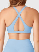 Airy Blue Yeoreo Wafiya sports bra back view, crisscross straps with center cutout highlighting back curve