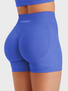 Electric Blue Baderiy 4.5" seamless shorts angled back view, seamless compression for a sculpted silhouette