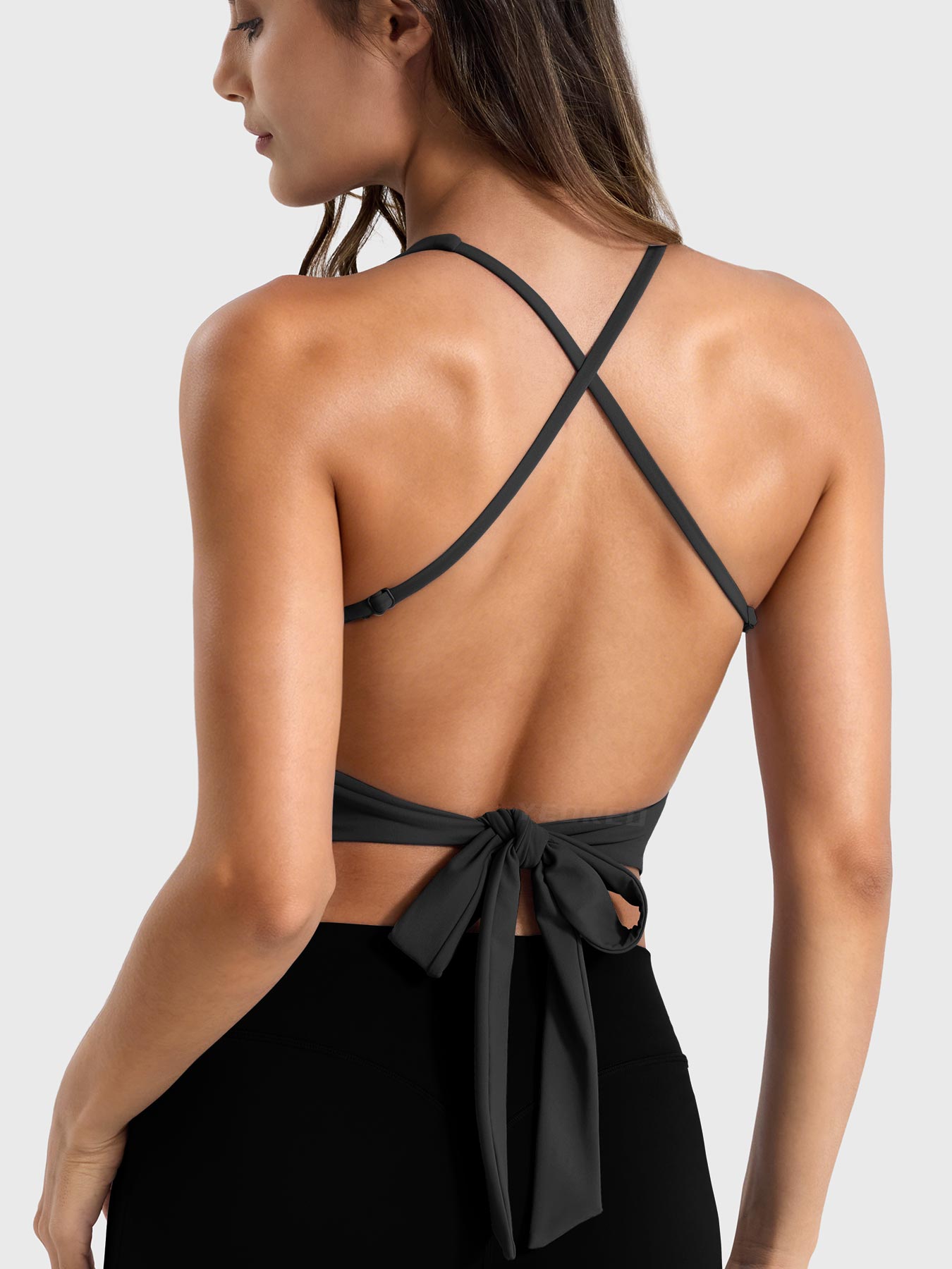 Black Yeoreo Kagina backless tie back active tank back view, open back with adjustable tie bow and spaghetti straps